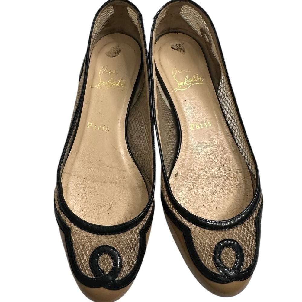 Christian Louboutin Mesh and Black Trim Flats size 6, a little bit of tear.